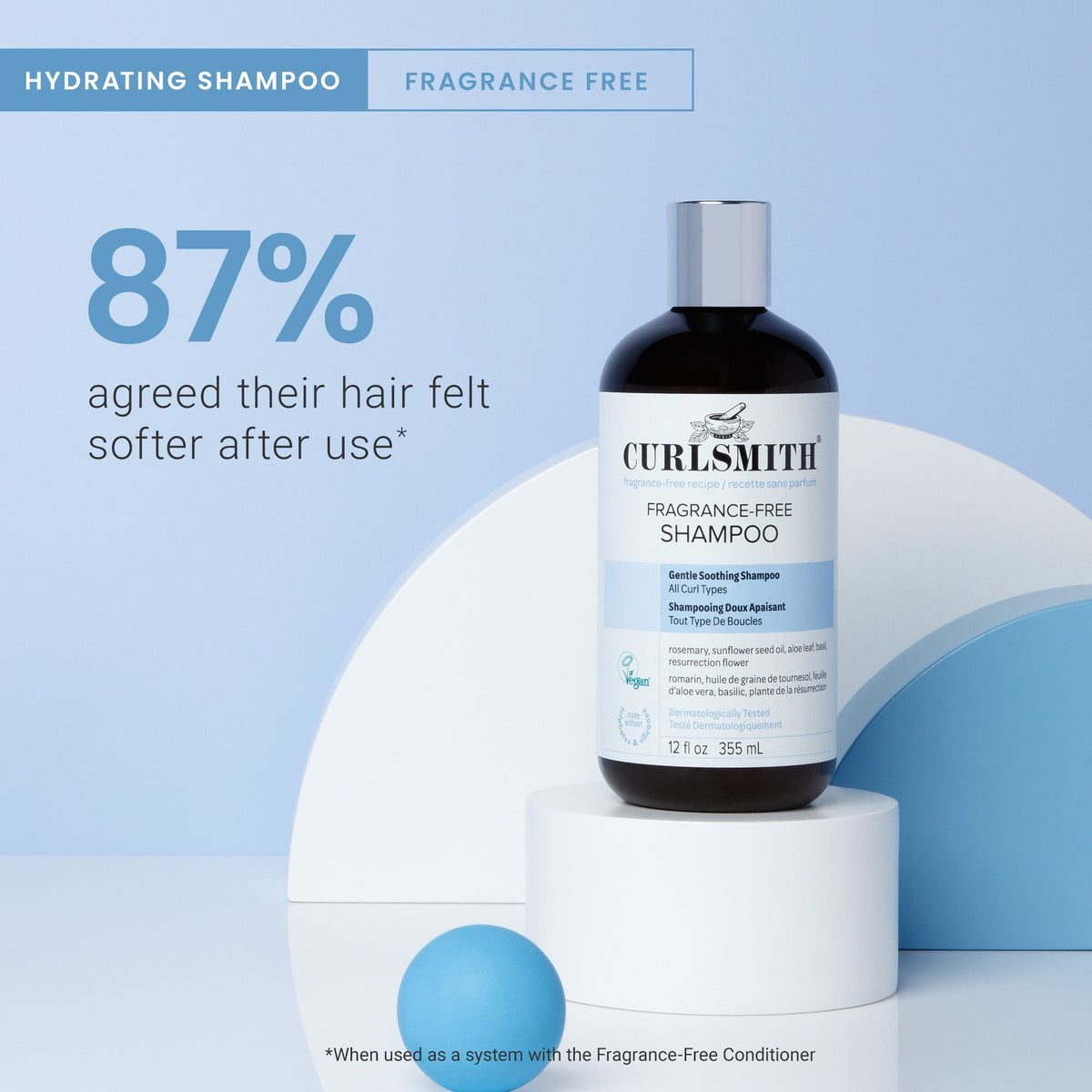 Curlsmith fragrance-free shampoo bottle on a white and blue background with text about hair softness.