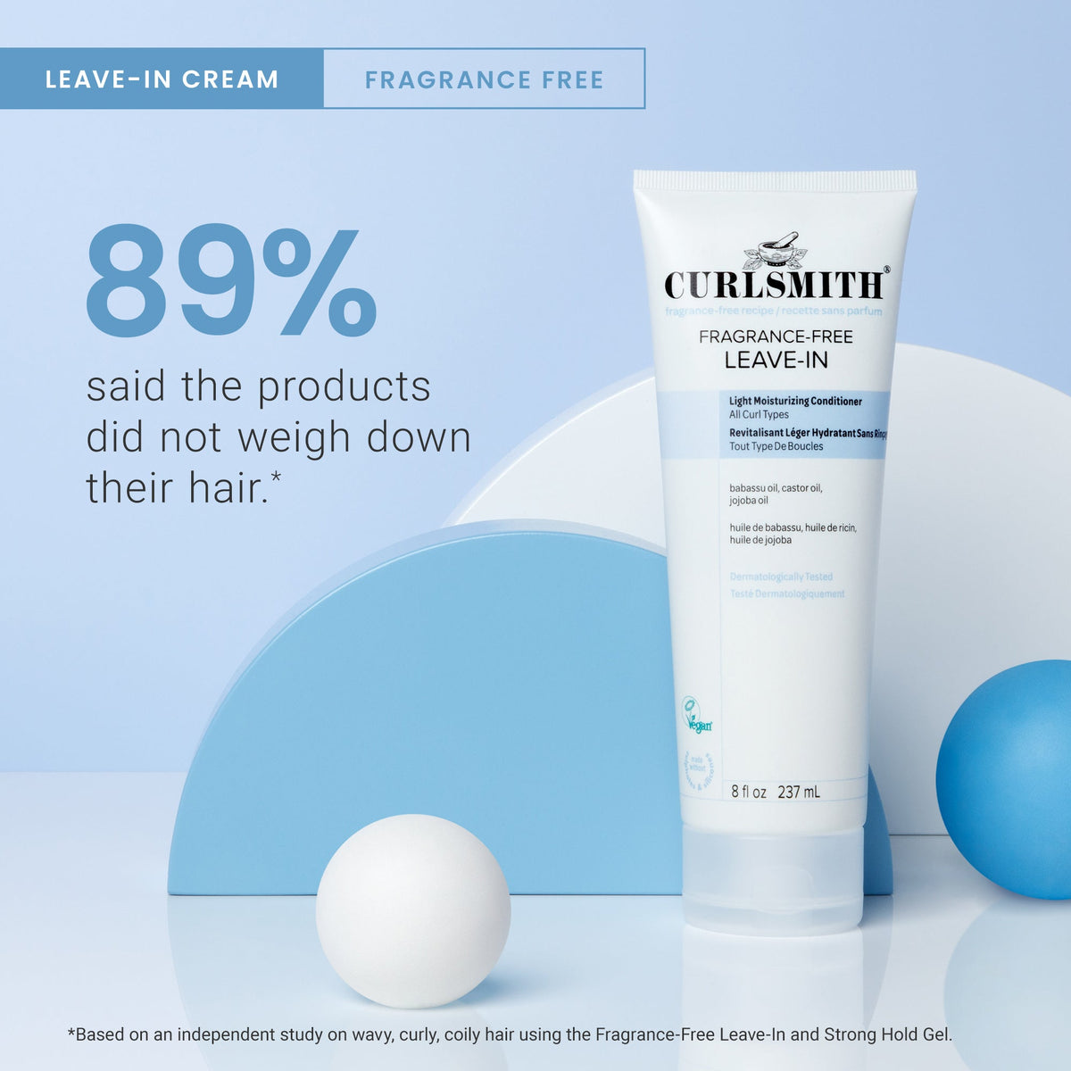 Curlsmith leave-in cream tube with text on a blue background