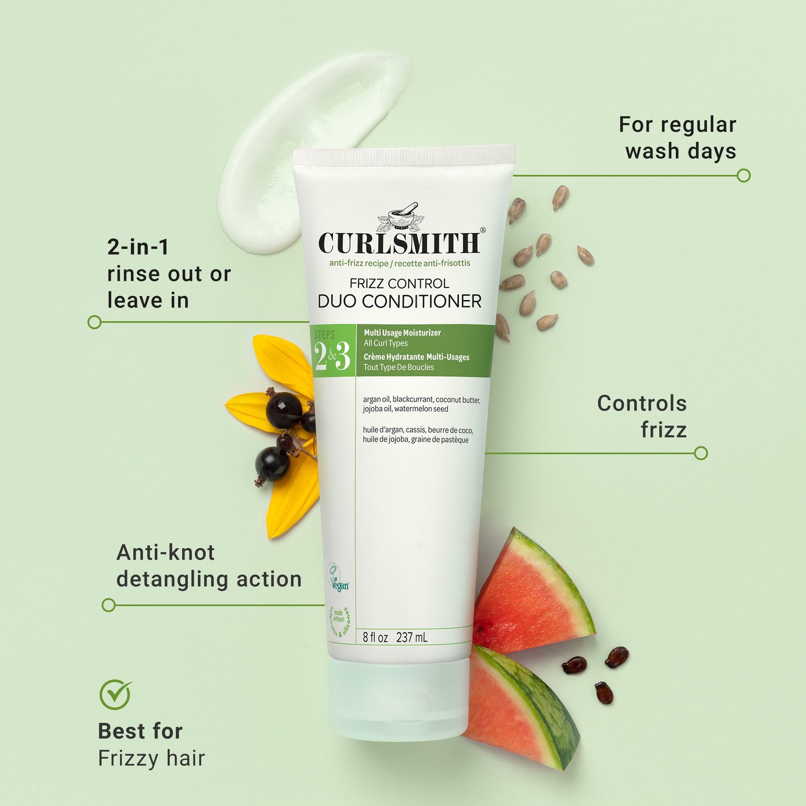 Curlsmitth frizz control duo conditioner with watermelon slices and seeds on a green background