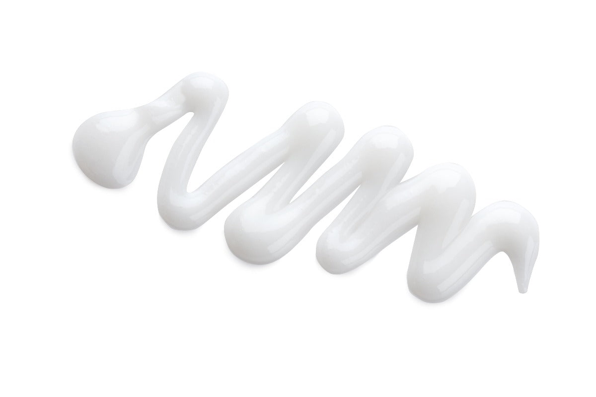 White cream swirl on a white background