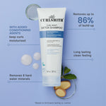 Curlsmith Curl Reset Detox Shampoo tube with product benefits on a blue background
