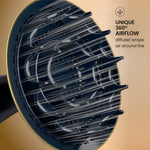 Close-up of a hair dryer diffuser with text on a beige background