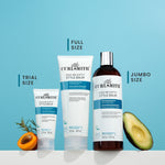 Curlsmit products including a bottle and tubes on a blue background with avocado and apricot slices.