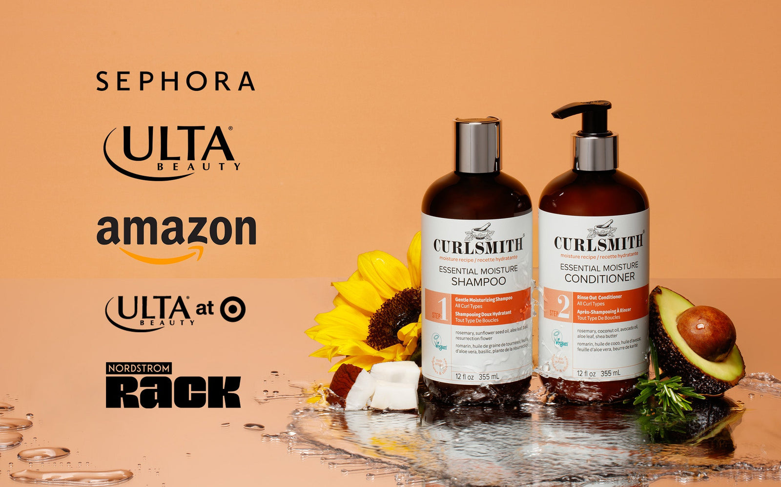 Two bottles of Curlsmith shampoo and conditioner on a wooden surface with branding logos in the background.